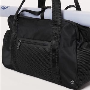 New black Lululemon duffel bag